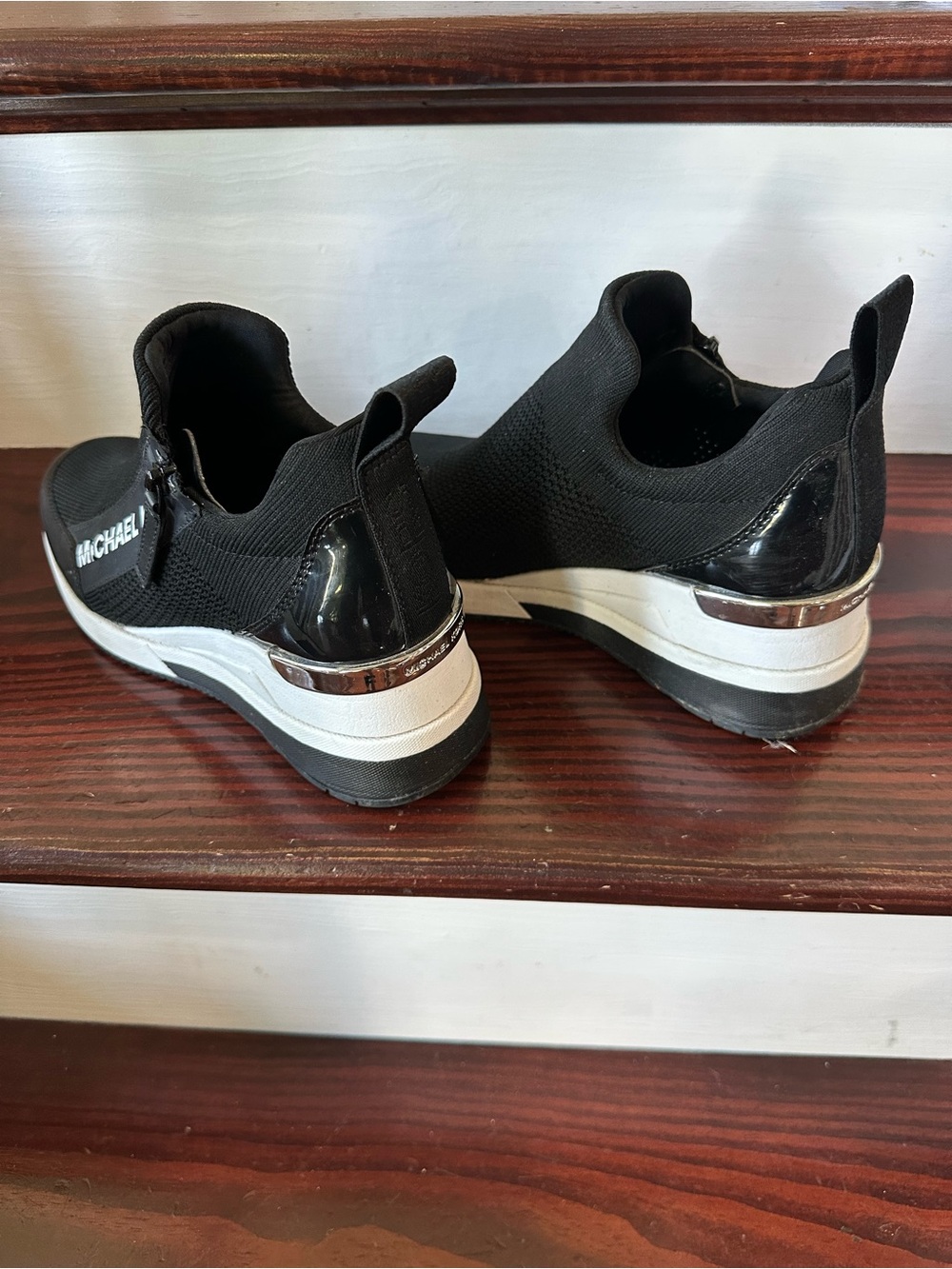 MICHAEL Michael Kors Black and White Slip-On Platform Sneakers